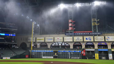 Rain pours into Minute Maid Park with roof closed