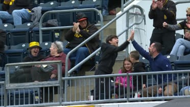 Pirates fans make nifty catches throughout game