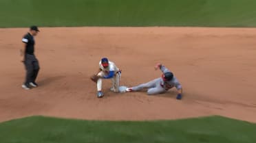 Jacob Young steals second base