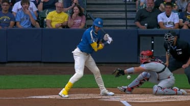 Garrett Mitchell scores on a wild pitch