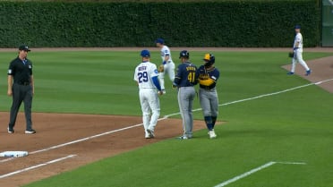 William Contreras hides to avoid the tag