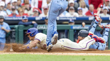 Tyler Heineman makes the tag at home plate