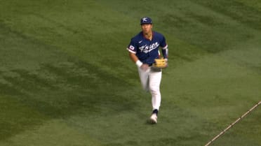 Hyun Min Ahn makes a sliding catch