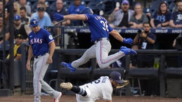Wyatt Langford safe after hurdling an attempted tag 