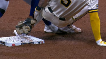 Garrett Mitchell steals second base after review 