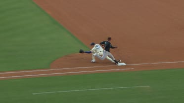 Tim Tawa out at first after review