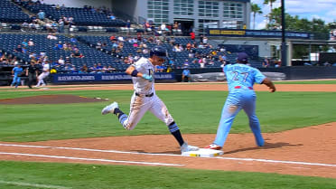 Jake Mangum reaches first on bunt single after review