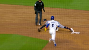 Maikel Garcia is safe at second after review