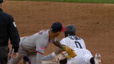 Luisangel Acuña's reaches third on throwing error