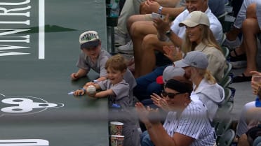 Gerrit Cole gifts ball to family in stands