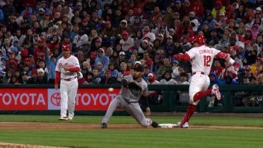 Kyle Schwarber is safe at first after review