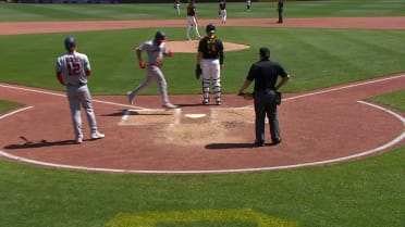 Luis García Jr. scores on a throwing error