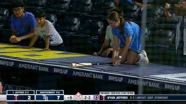 Yandy Díaz gives young fan a bat during game