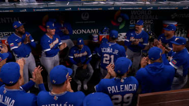 Venezuela parties in dugout before game vs. Nicaragua