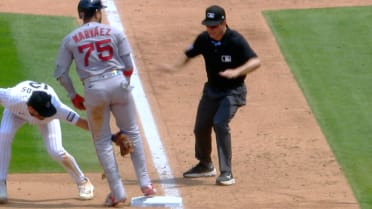 Carlos Narváez is out at third after review
