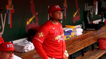 Yadier Molina visits the Cardinals dugout
