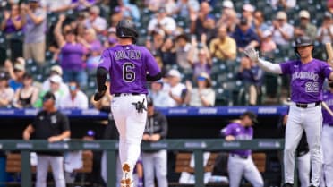 Edouard Julien scores on a wild pitch