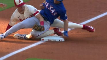 Sam Haggerty is out at third after review 