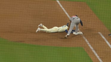 Hyeseong Kim safe at first after challenge