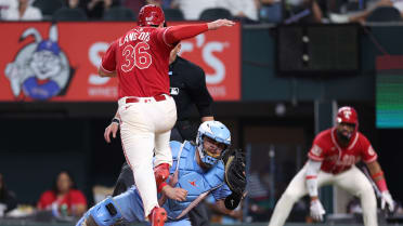 Wyatt Langford hurdles over catcher for run