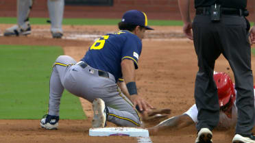 Nelson Velázquez safe at third after review