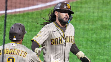 Manny Machado remolca a Fernando Tatis Jr.