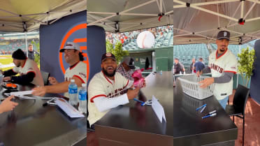 Giants players sign random items at GiantsFest