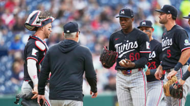 Kendry Rojas leaves game with apparent hand injury