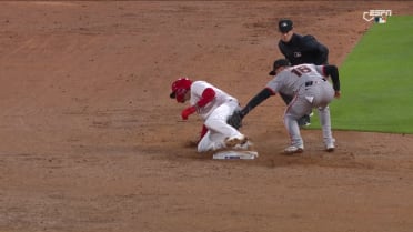 Nick Castellanos steals second base after review