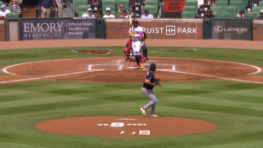 Ronald Acuña Jr. walks to first before pitch arrives