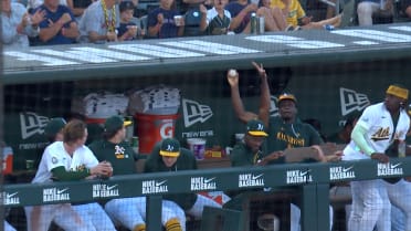 Denzel Clarke makes bare-handed catch in dugout