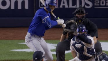 Andrés Giménez hit by pitch after review