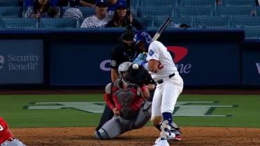 Miguel Rojas gets hit by a pitch after review