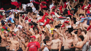Stephen F. Austin club baseball team on watching game