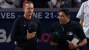 Aaron Boone, umpire pause argument to honor America