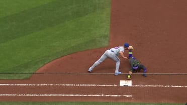 José Caballero gets back to first safely 