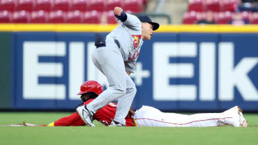 Iván Herrera nabs Elly De La Cruz after a challenge