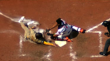 Fernando Tatis Jr. hits sacrifice fly after review