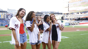Gold medalists from Paris throw out first pitch