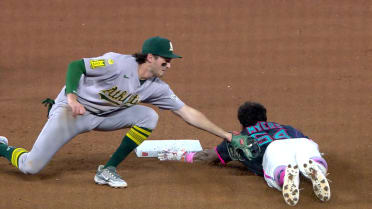 Dane Myers steals second base after review