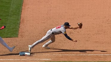 Austin Riley nabs José Tena at first after review
