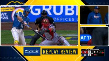 Sal Frelick reaches on catchers interference after review