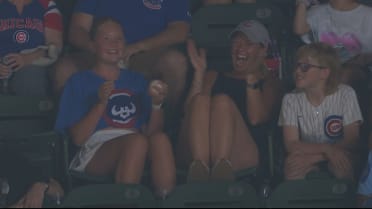 Foul ball lands in Cub fans' lap