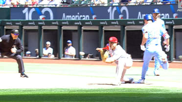 Evan Carter singles after a review