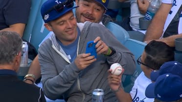 Ball lands in Dodgers fan's seat