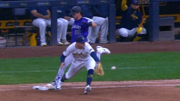 Nolan Jones takes first base after Rockies challenge