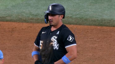 Josh Rojas steals second base