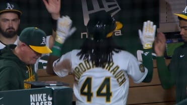 Joshua Kuroda-Grauer scores on a wild pitch