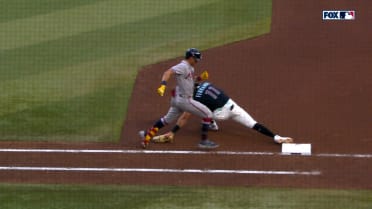 Mauricio Dubón is out at first base after a review