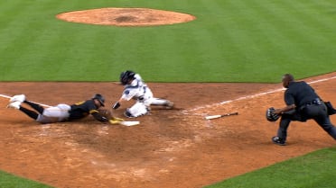 Tommy Pham safe at the plate after review